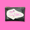 Glitter infused black vinyl clutch with a white 'Ghostface' applique with pink confetti weed leaves for the eyes, nose, and mouth. Clutch is adorned on top with a cute XOXO zipper pull that is a signature of the Julie Mollo! brand. Clutch is featured on a bright pink background. 