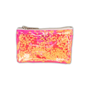 clear pink vinyl bag filled with 420 friendly confetti keychain clutch cosmetic clutch by julie mollo and kush kards orange confetti and orange background