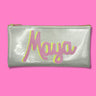 Cute and custom silver glitter infused clutch with a yellow and pink sparkly "Maya" name applique sewn on the front.